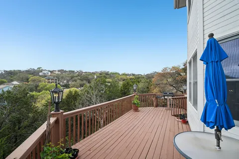 a view of balcony with furniture