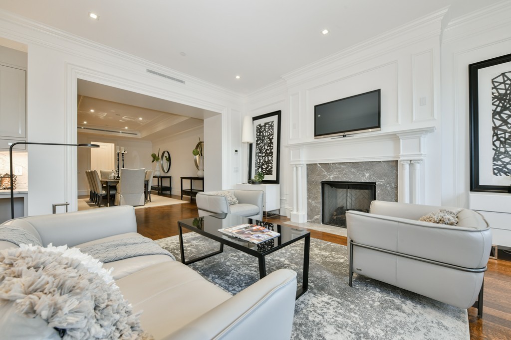 35 Commonwealth Avenue, Unit PH Boston, MA 02116 - Photo 4 of 25 a living room with furniture fireplace and window
