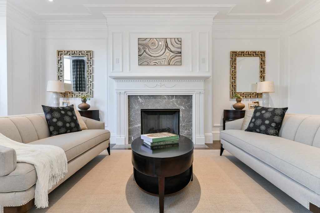 35 Commonwealth Avenue, Unit PH Boston, MA 02116 - Photo 5 of 25 a living room with furniture and a fireplace