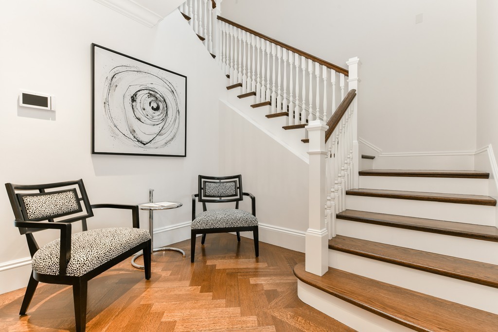 35 Commonwealth Avenue, Unit PH Boston, MA 02116 - Photo 10 of 25 a view of entryway and hall with wooden floor