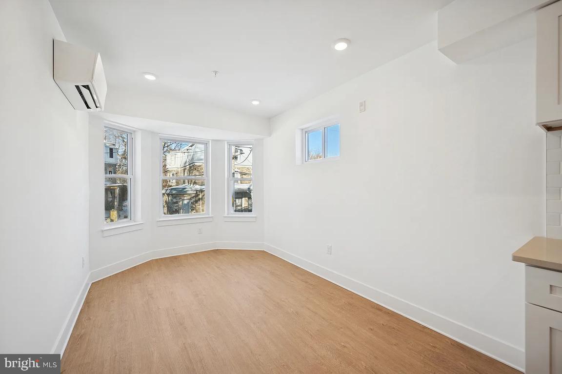 3413 North 19th Street, Unit 2F Philadelphia, PA 19140 - Photo 14 of 24 an empty room with windows
