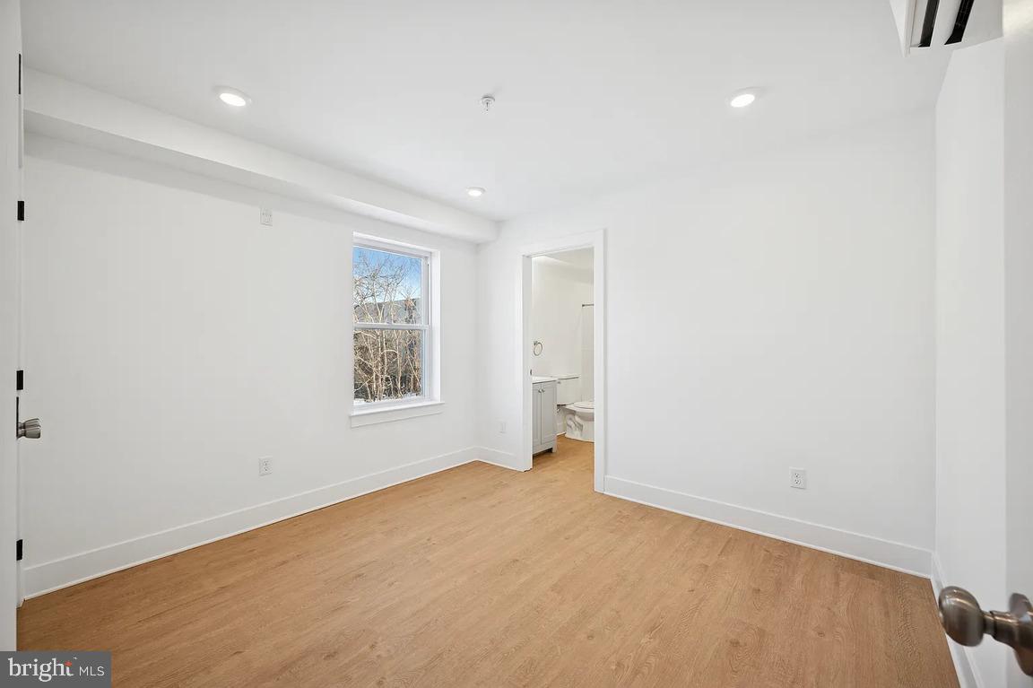 3413 North 19th Street, Unit 2F Philadelphia, PA 19140 - Photo 15 of 24 an empty room with a window