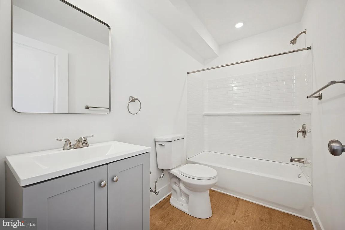 3413 North 19th Street, Unit 2F Philadelphia, PA 19140 - Photo 17 of 24 a bathroom with a sink toilet and shower