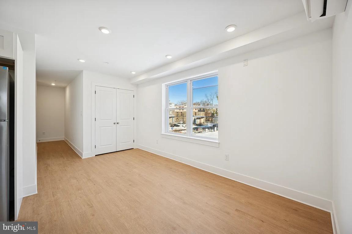 3413 North 19th Street, Unit 2F Philadelphia, PA 19140 - Photo 22 of 24 a view of an empty room with a window