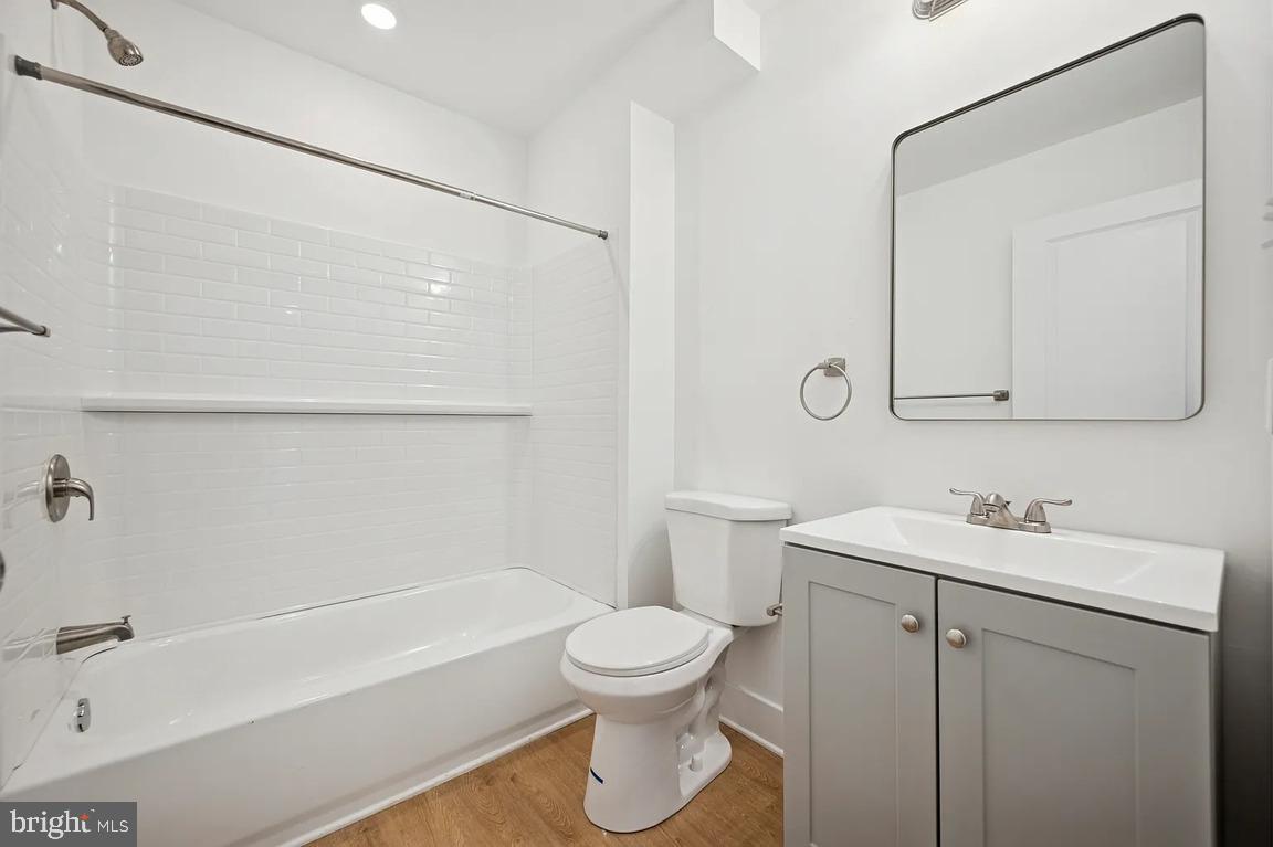 3413 North 19th Street, Unit 2F Philadelphia, PA 19140 - Photo 9 of 24 a bathroom with a sink toilet and shower