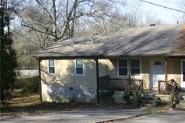 a view of a porch with furniture