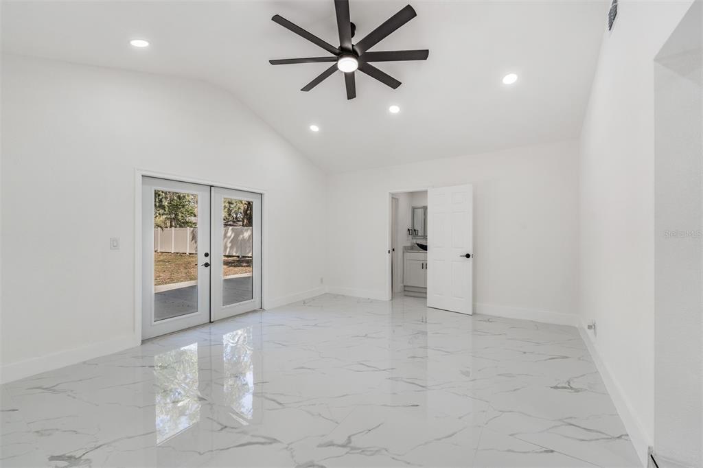 1413 May Street Lutz, FL 33548 - Photo 11 of 21 an empty room with closet and windows