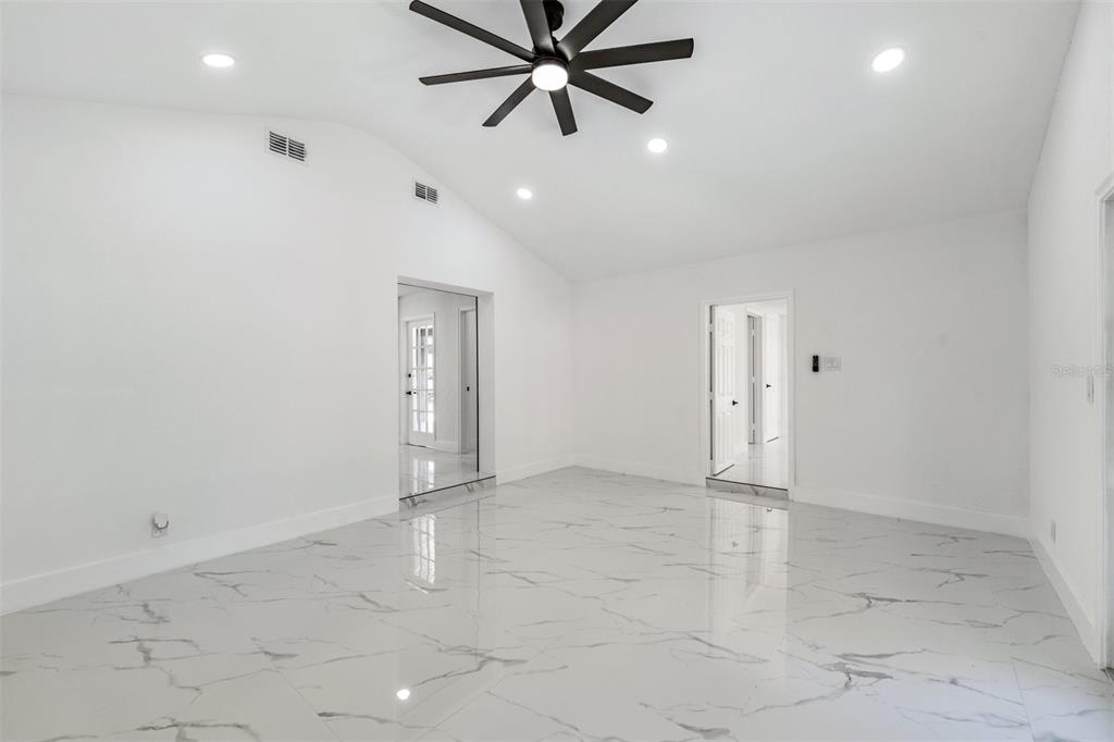 1413 May Street Lutz, FL 33548 - Photo 12 of 21 an empty room with closet and windows