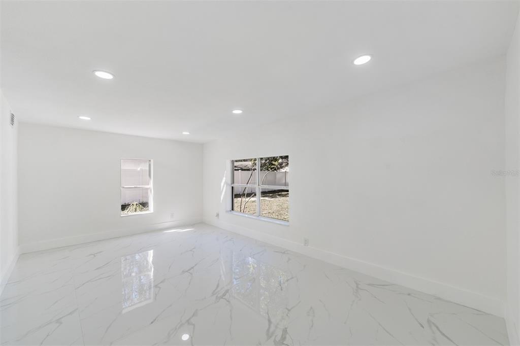 1413 May Street Lutz, FL 33548 - Photo 15 of 21 an empty room with windows