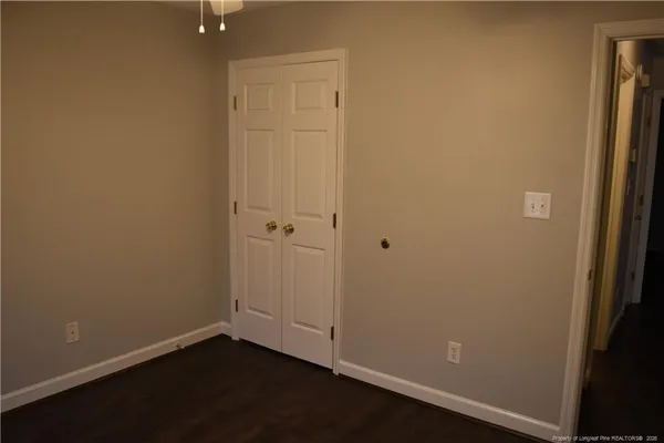 an empty room with a door