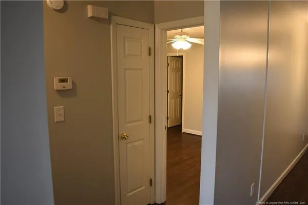 a bathroom with a shower and a mirror