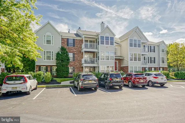 a cars parked in front of a building