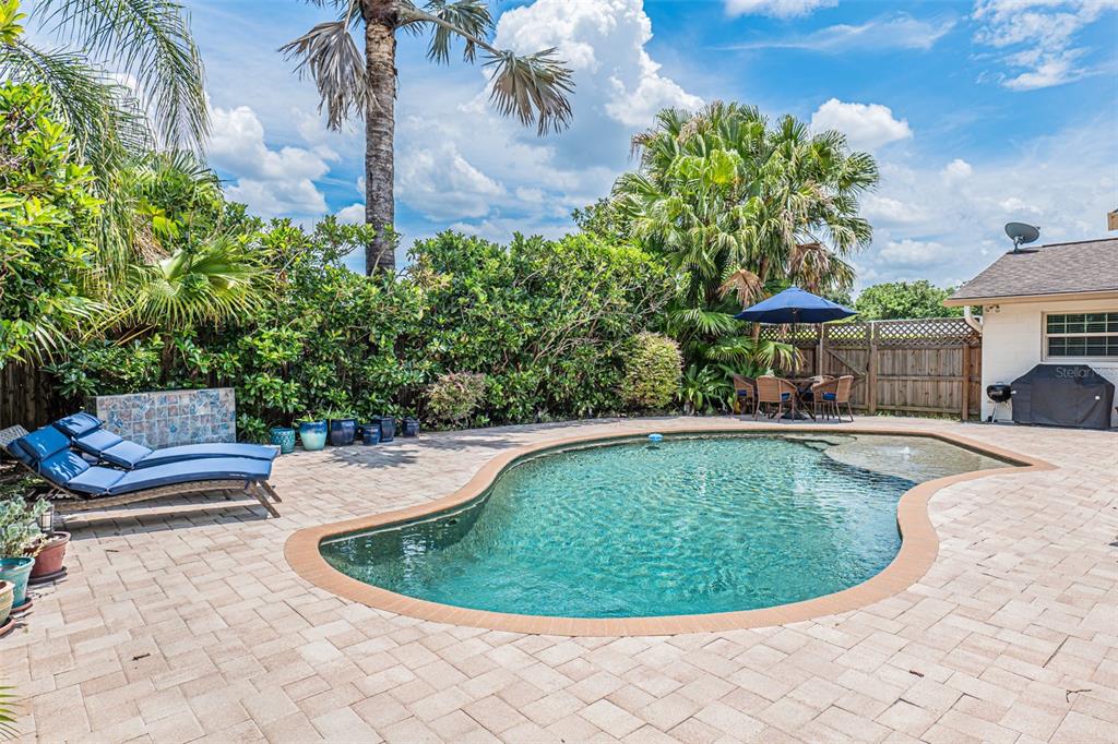 741 Brookside Road Maitland, FL 32751 - Photo 40 of 43 a view of a swimming pool with a patio
