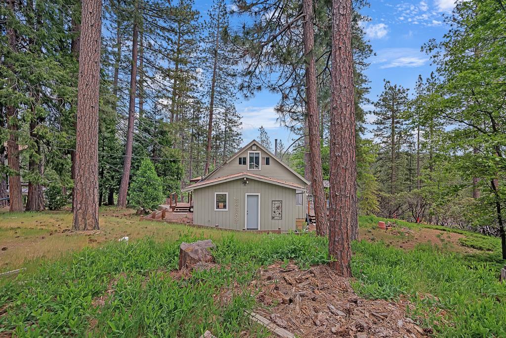 1753 Lightning Lane Arnold, CA 95223 - Photo 2 of 46 a front view of a house with garden