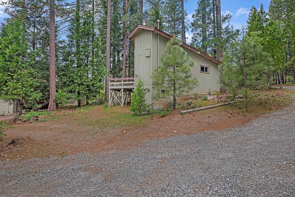 1753 Lightning Lane Arnold, CA 95223 - Photo 29 of 46 a front view of a house with garden