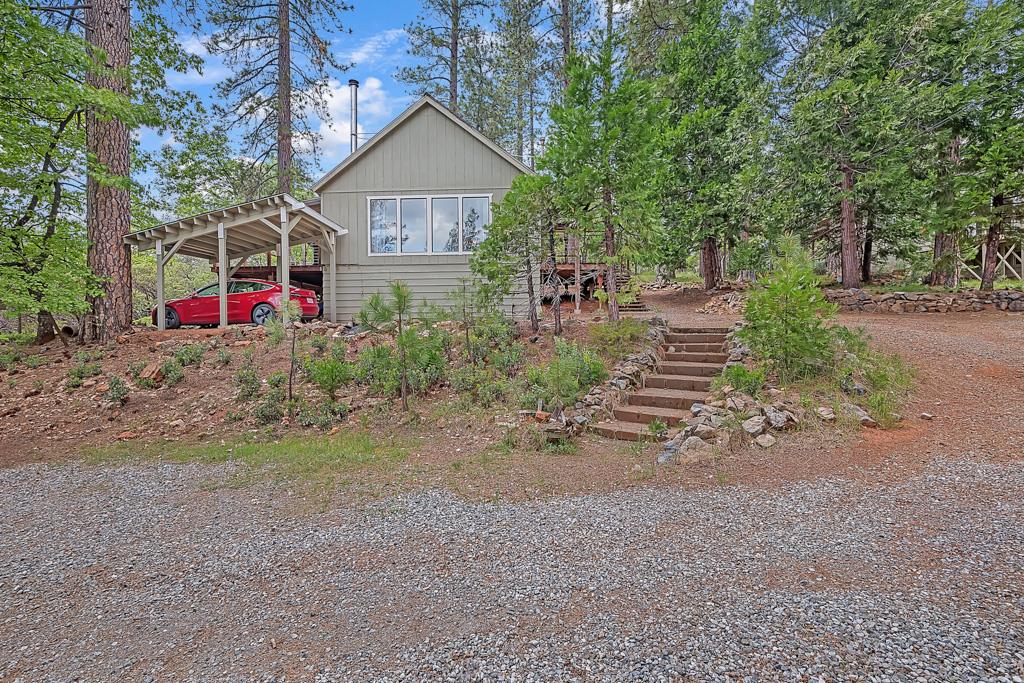1753 Lightning Lane Arnold, CA 95223 - Photo 46 of 46 a view of a house with a street and trees