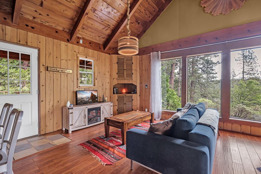 1753 Lightning Lane Arnold, CA 95223 - Photo 9 of 46 a living room with furniture and a large window