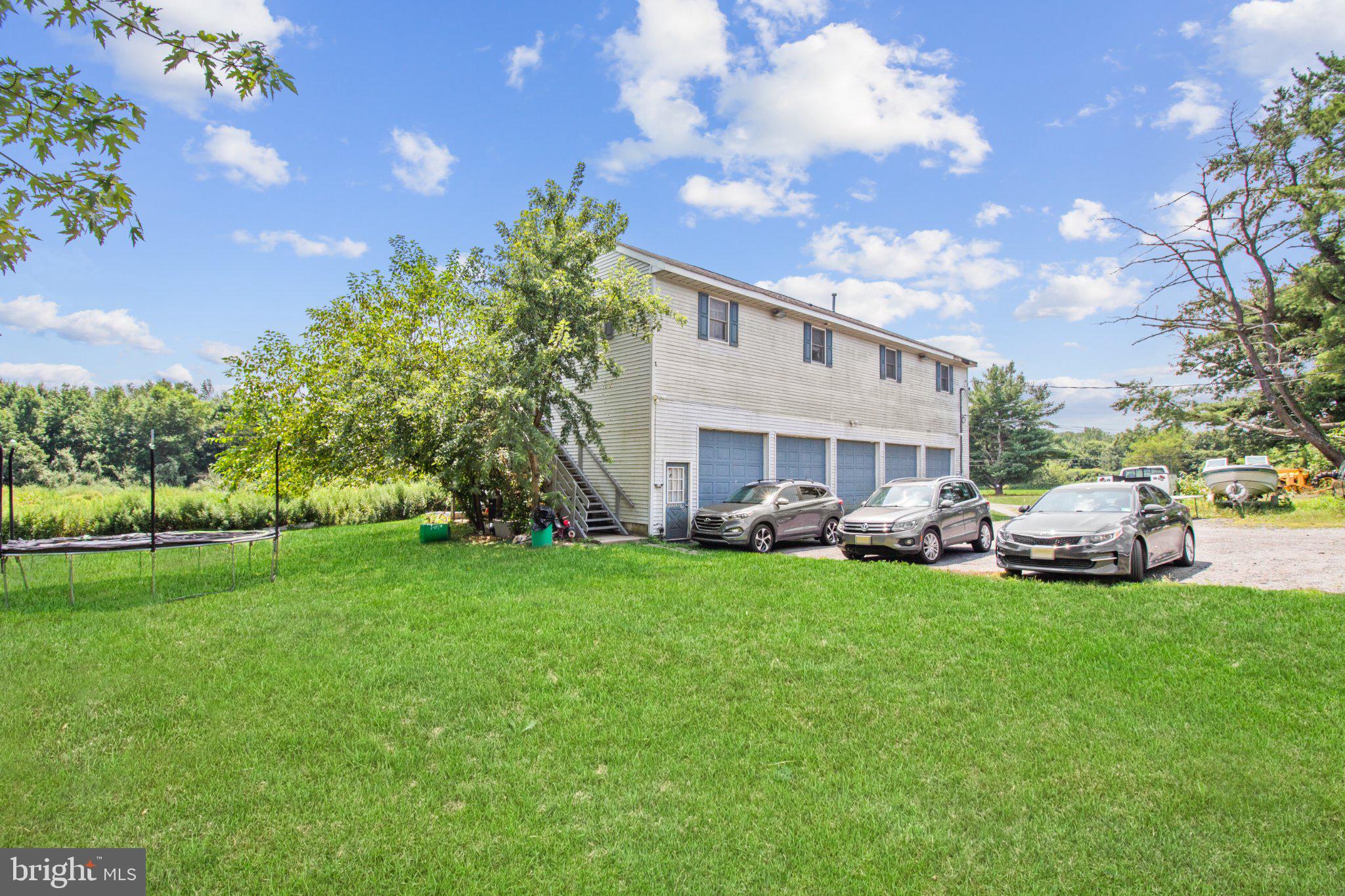 33 Allens Road Hightstown, NJ 08520 - Photo 3 of 12 Charming home with lush green surroundings.