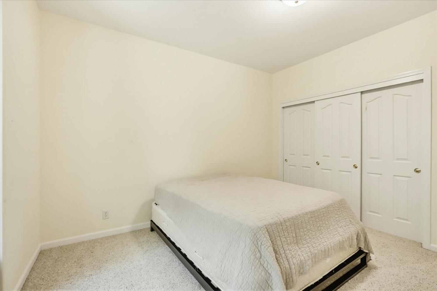 14517 North Bloomfield Road Nevada City, CA 95959 - Photo 36 of 78 a room with a bed and a cabinet