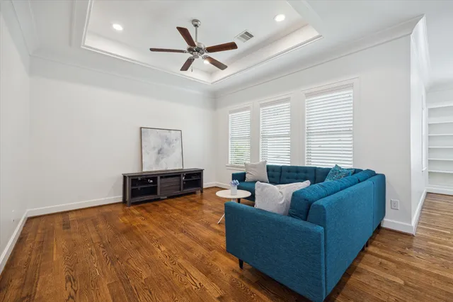 a living room with furniture and window