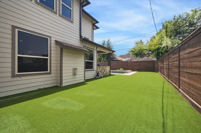 a view of a backyard with a garden