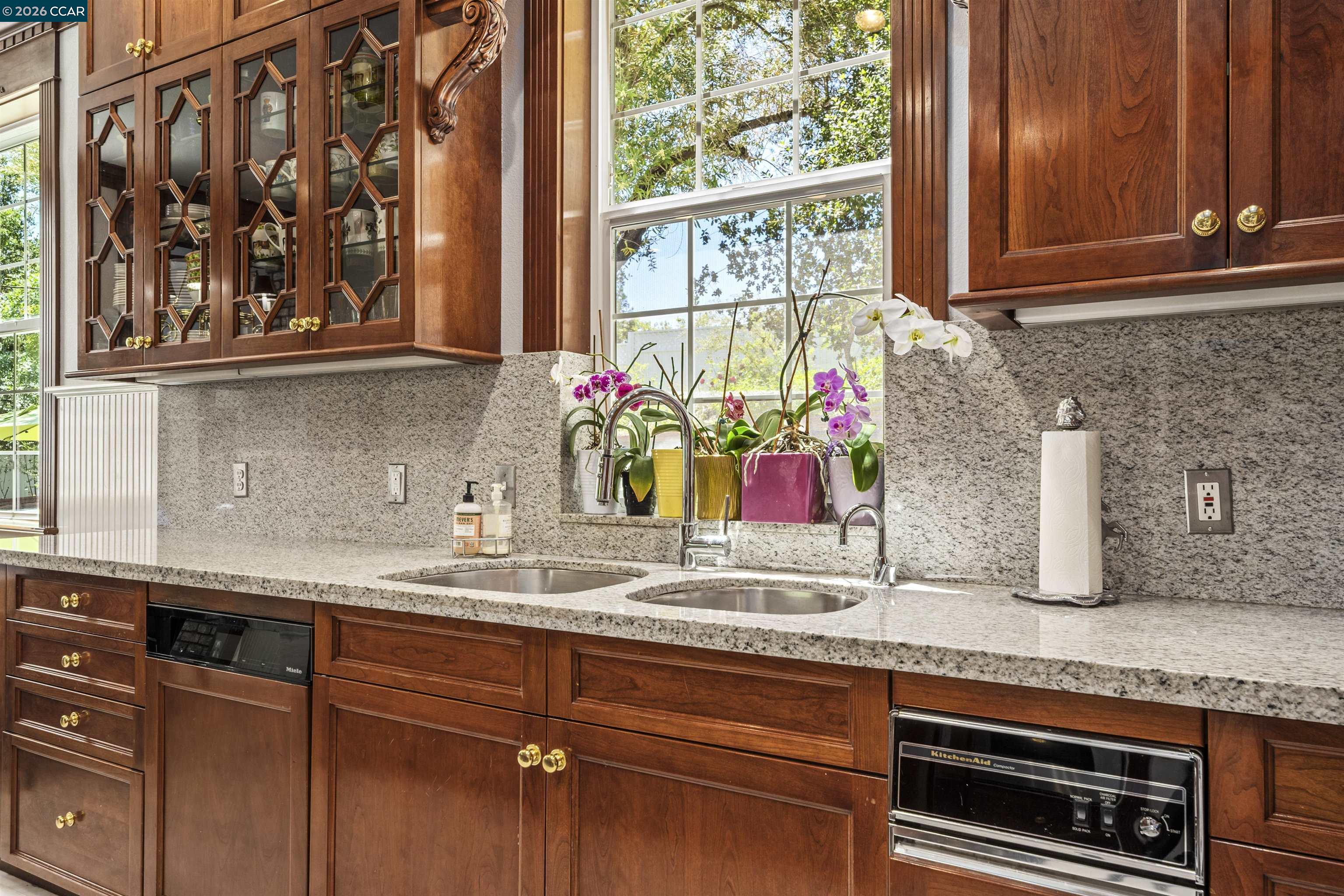 177 Oak Road Alamo, CA 94507 - Photo 21 of 85 a kitchen with granite countertop cabinets and window