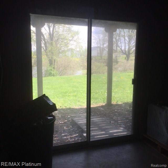 2755 North Hughes Road Howell, MI 48855 - Photo 51 of 57 Walkout Sliding doors to the Pond.
