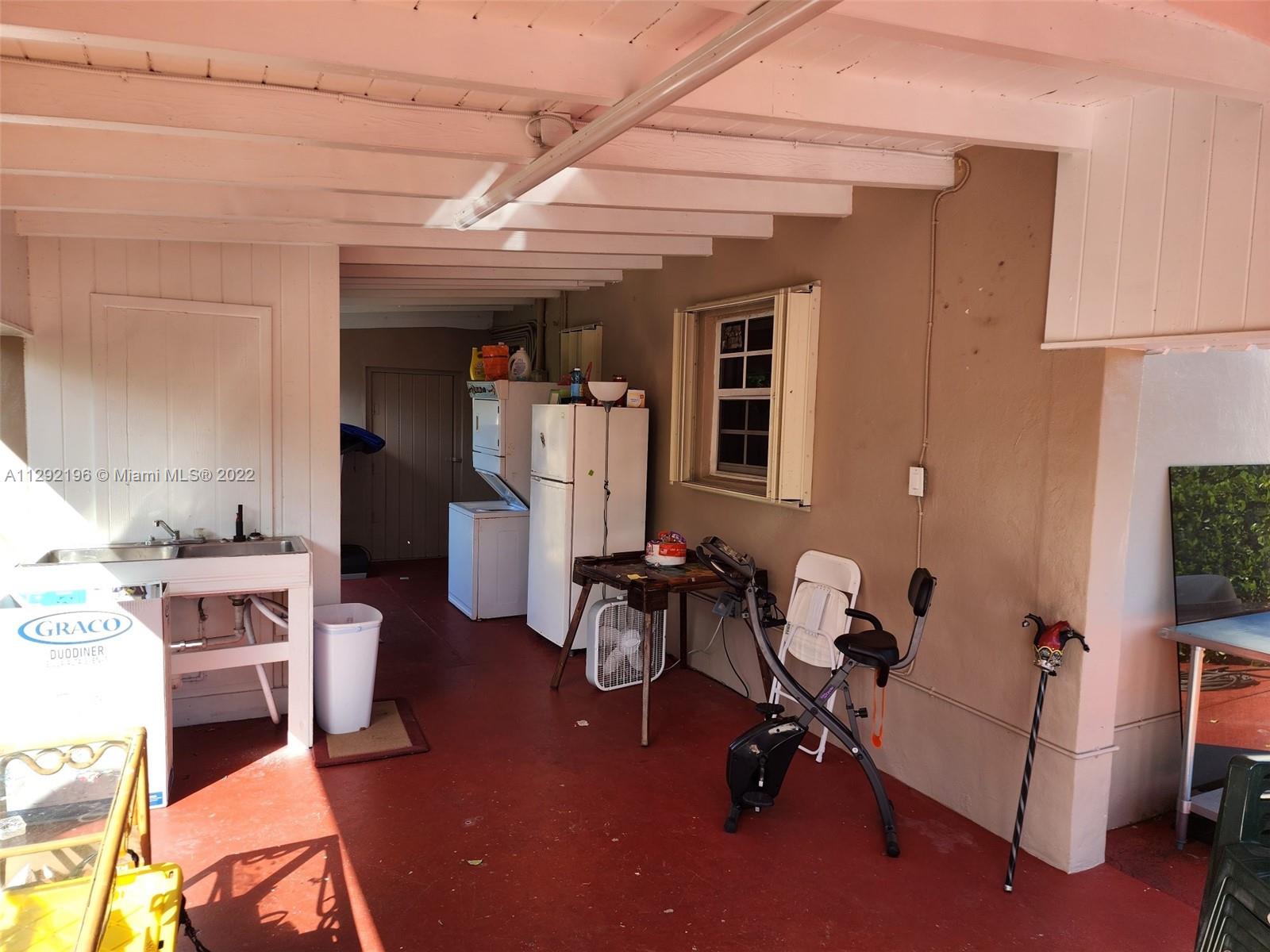 Tropical Estates Miami, FL 33165 - Photo 21 of 31 a view of a room with gym equipment