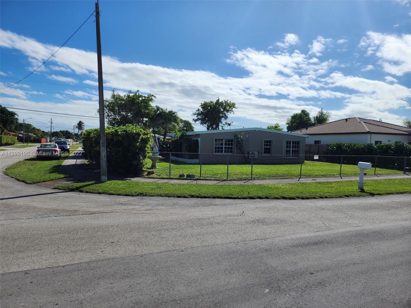 Tropical Estates Miami, FL 33165 - Photo 30 of 31 a view of a green field