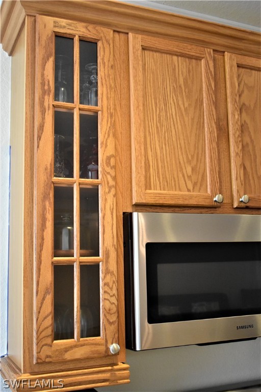 4002 Cherrybrook Loop Fort Myers, FL 33966 - Photo 16 of 35 a view of bedroom with a fireplace and a window