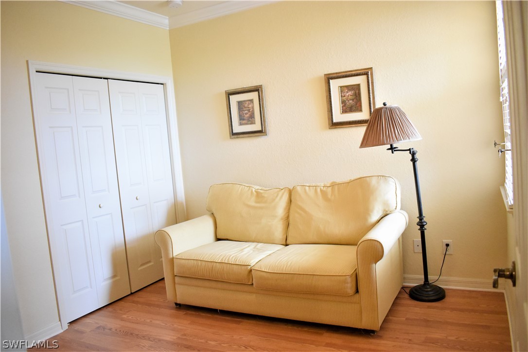 4002 Cherrybrook Loop Fort Myers, FL 33966 - Photo 23 of 35 a living room with couch and a walk in closet