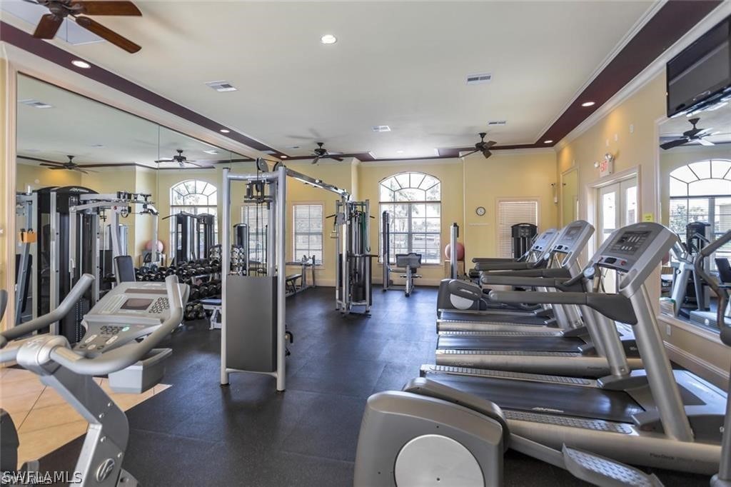 4002 Cherrybrook Loop Fort Myers, FL 33966 - Photo 26 of 35 a living room with lots of furniture and wooden floor