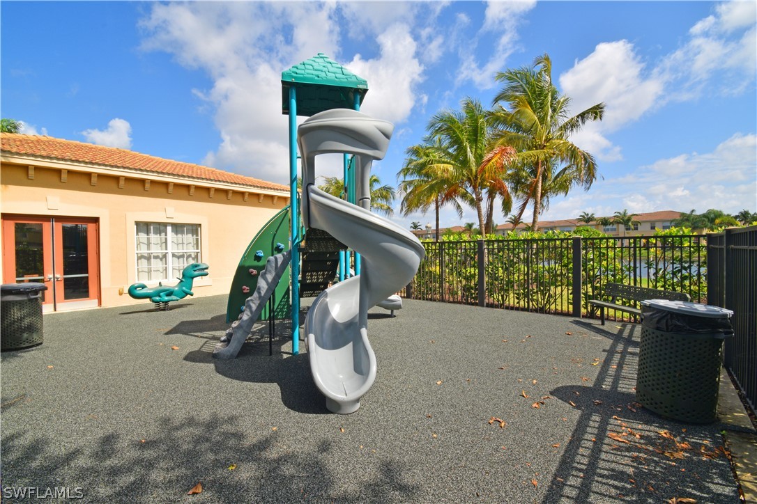 4002 Cherrybrook Loop Fort Myers, FL 33966 - Photo 28 of 35 a view of a two chair and tables in the patio