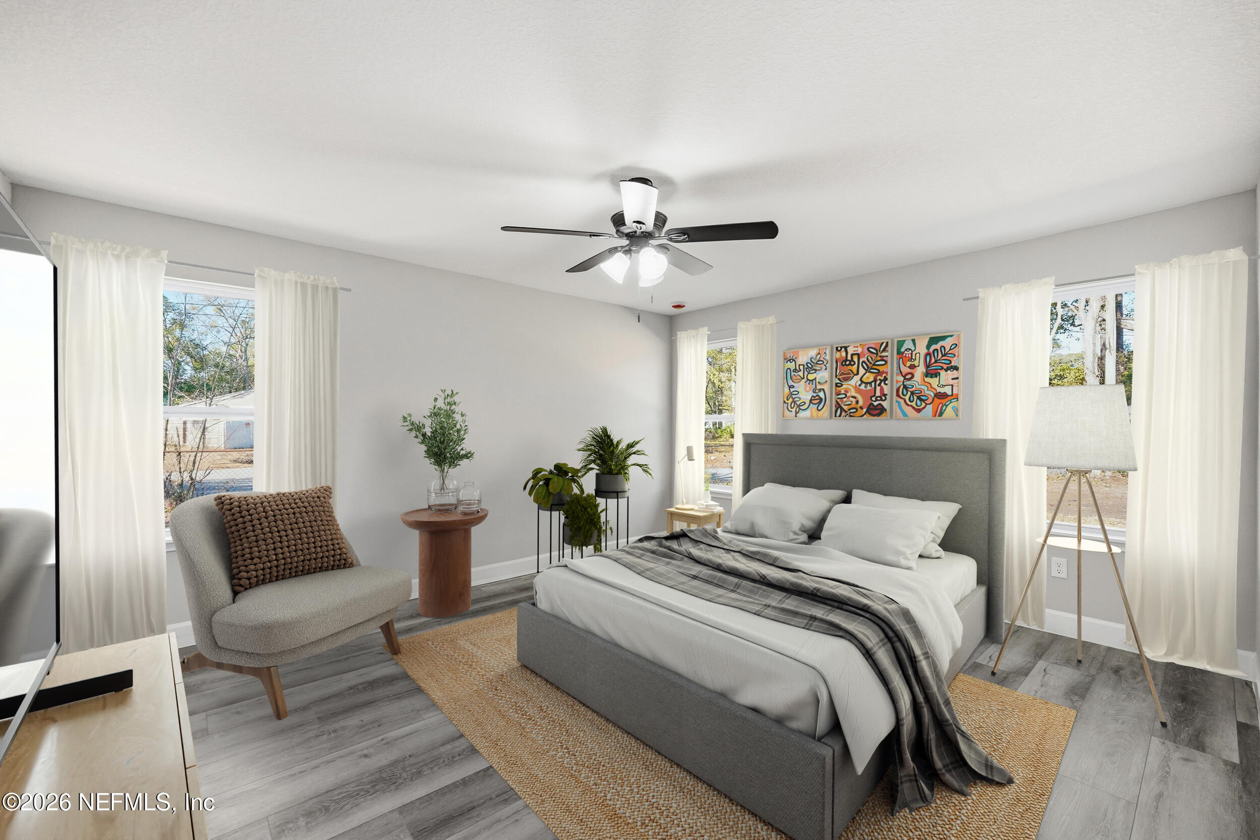 5259 Shenandoah Avenue Jacksonville, FL 32254 - Photo 14 of 51 a bedroom with a large bed and a couch