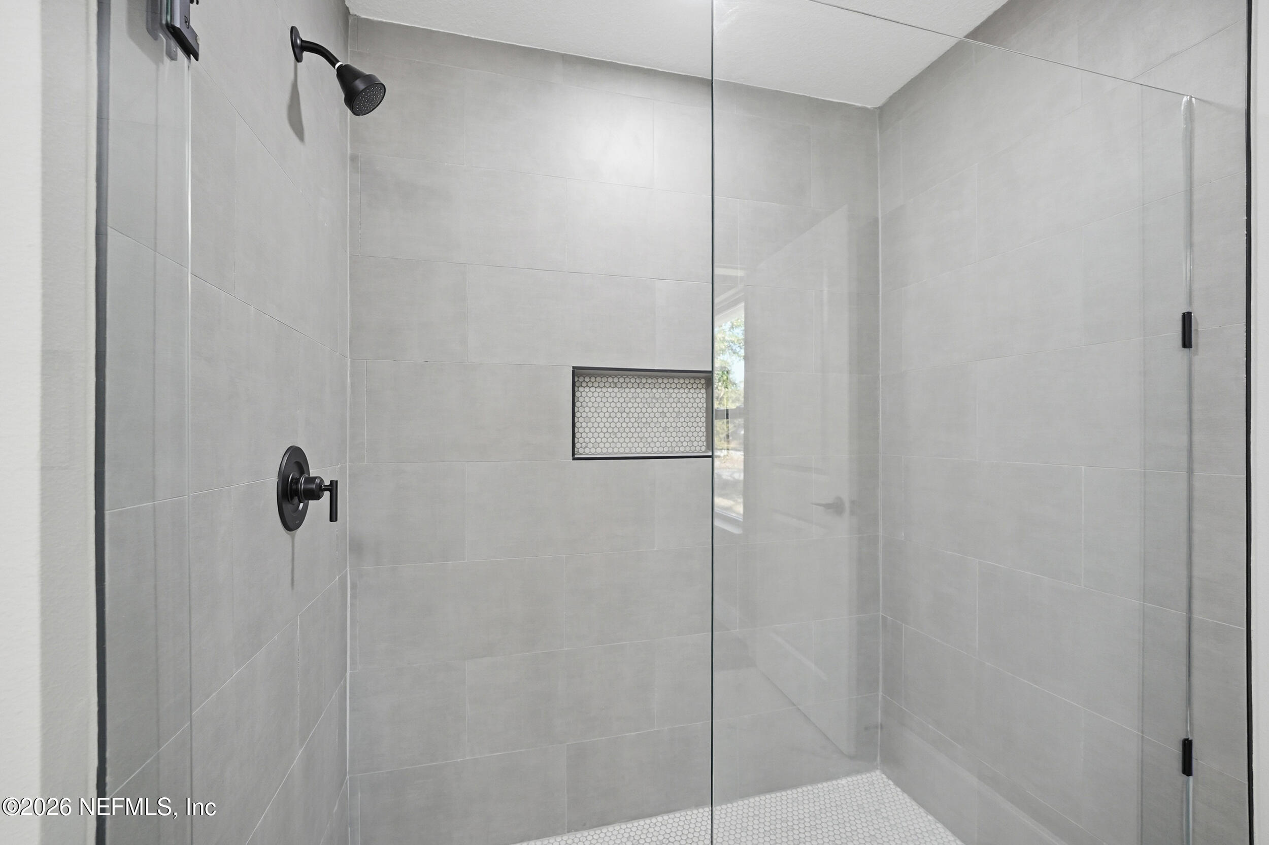 5259 Shenandoah Avenue Jacksonville, FL 32254 - Photo 16 of 51 a bathroom with a shower