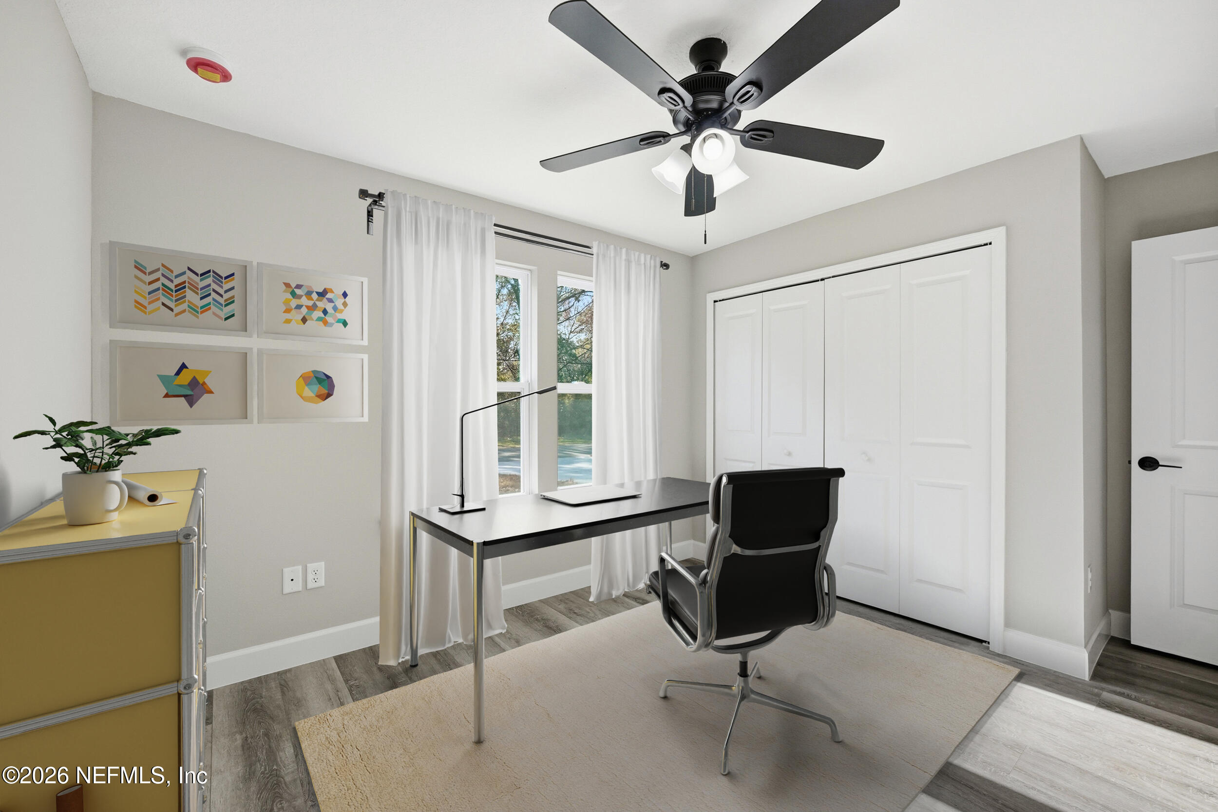 5259 Shenandoah Avenue Jacksonville, FL 32254 - Photo 19 of 51 a view of a livingroom with furniture and a ceiling fan