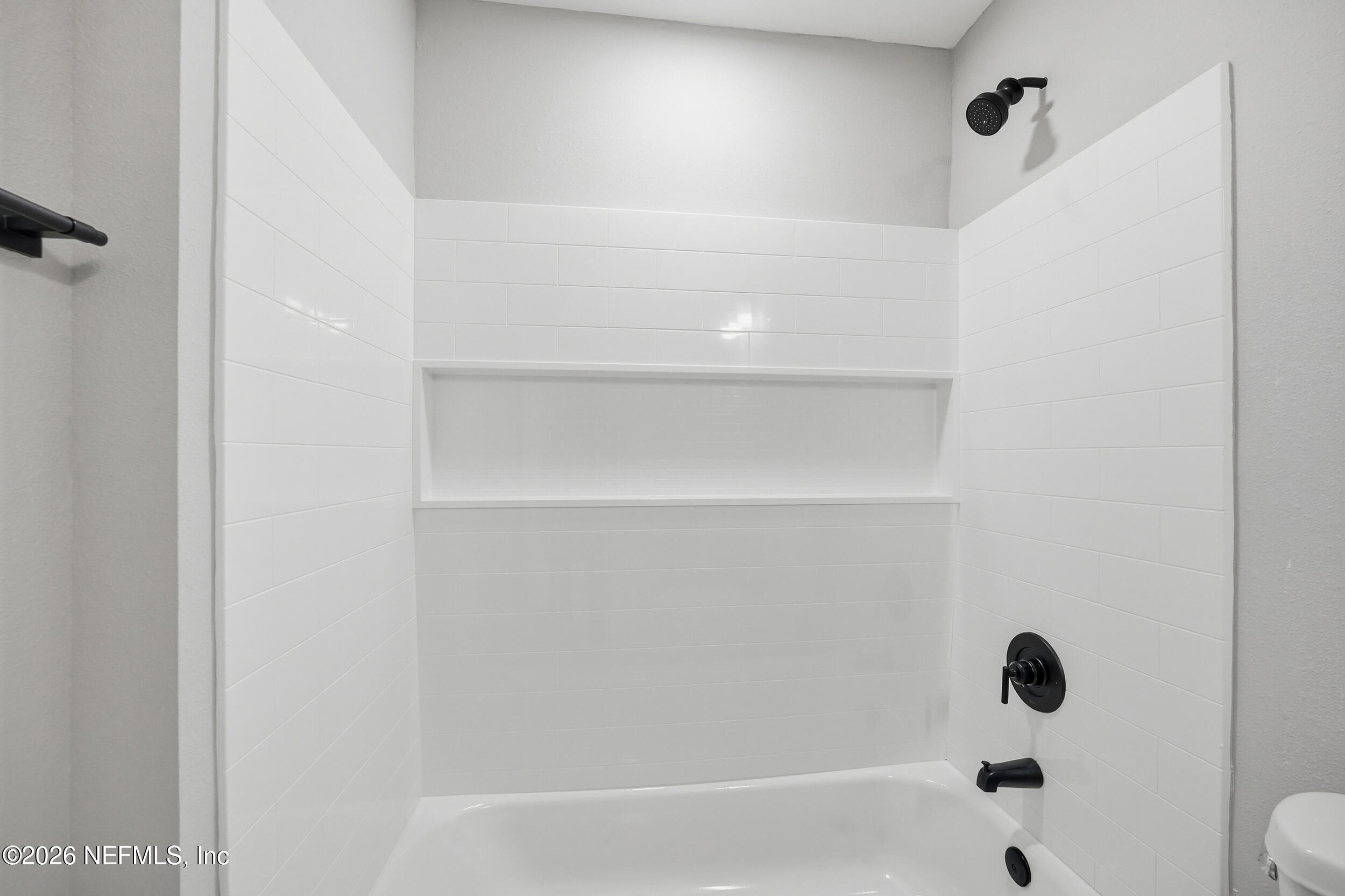 5259 Shenandoah Avenue Jacksonville, FL 32254 - Photo 21 of 51 a bathroom with a bathtub