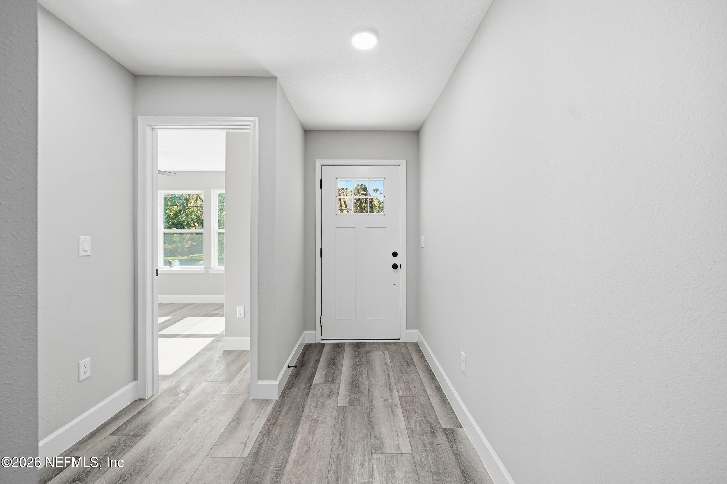 5259 Shenandoah Avenue Jacksonville, FL 32254 - Photo 3 of 51 a view of a room with wooden floor and a window