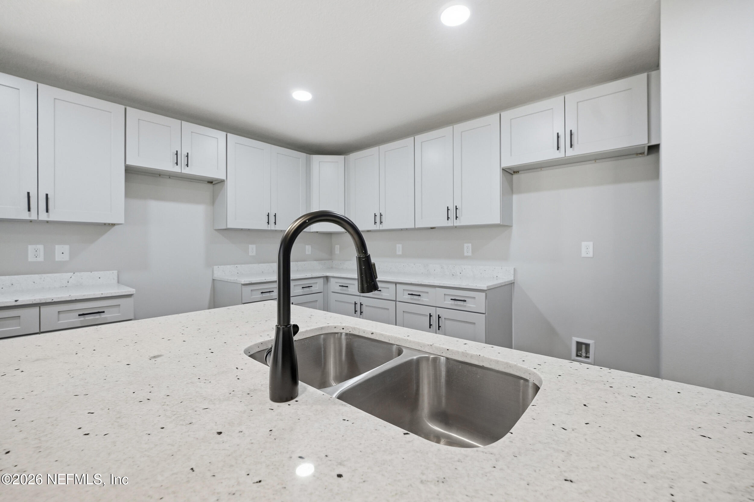 5259 Shenandoah Avenue Jacksonville, FL 32254 - Photo 6 of 51 a kitchen with stainless steel appliances granite countertop a sink a stove and refrigerator