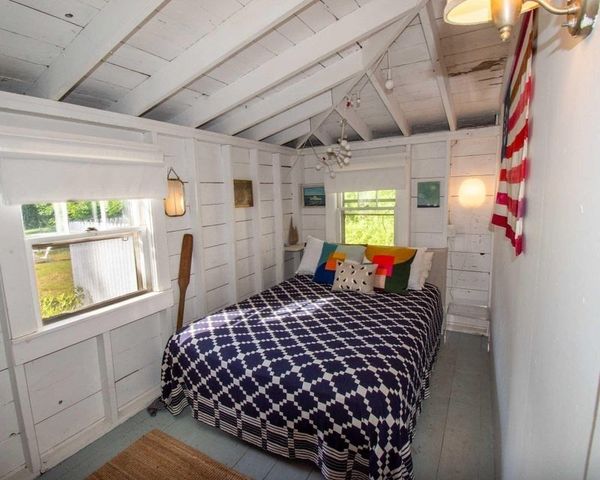 a bedroom with a bed and a cabinets