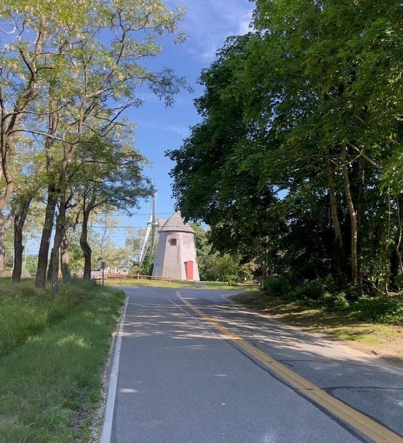 50 Mill Road Eastham, MA 02642 - Photo 25 of 26 a view of a house with a yard