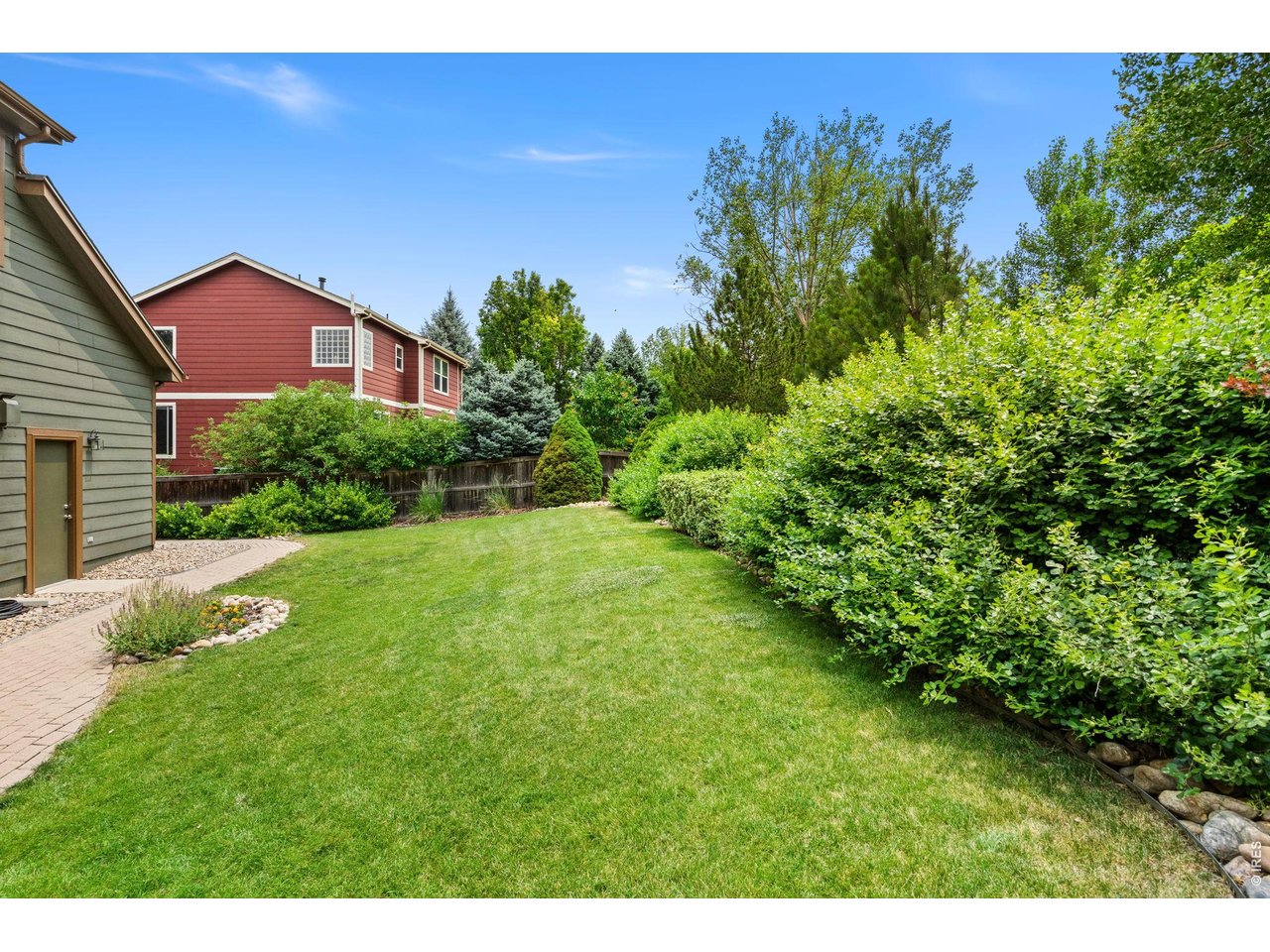 639 Americana Road Longmont, CO 80504 - Photo 44 of 50 Well cared for landscaping