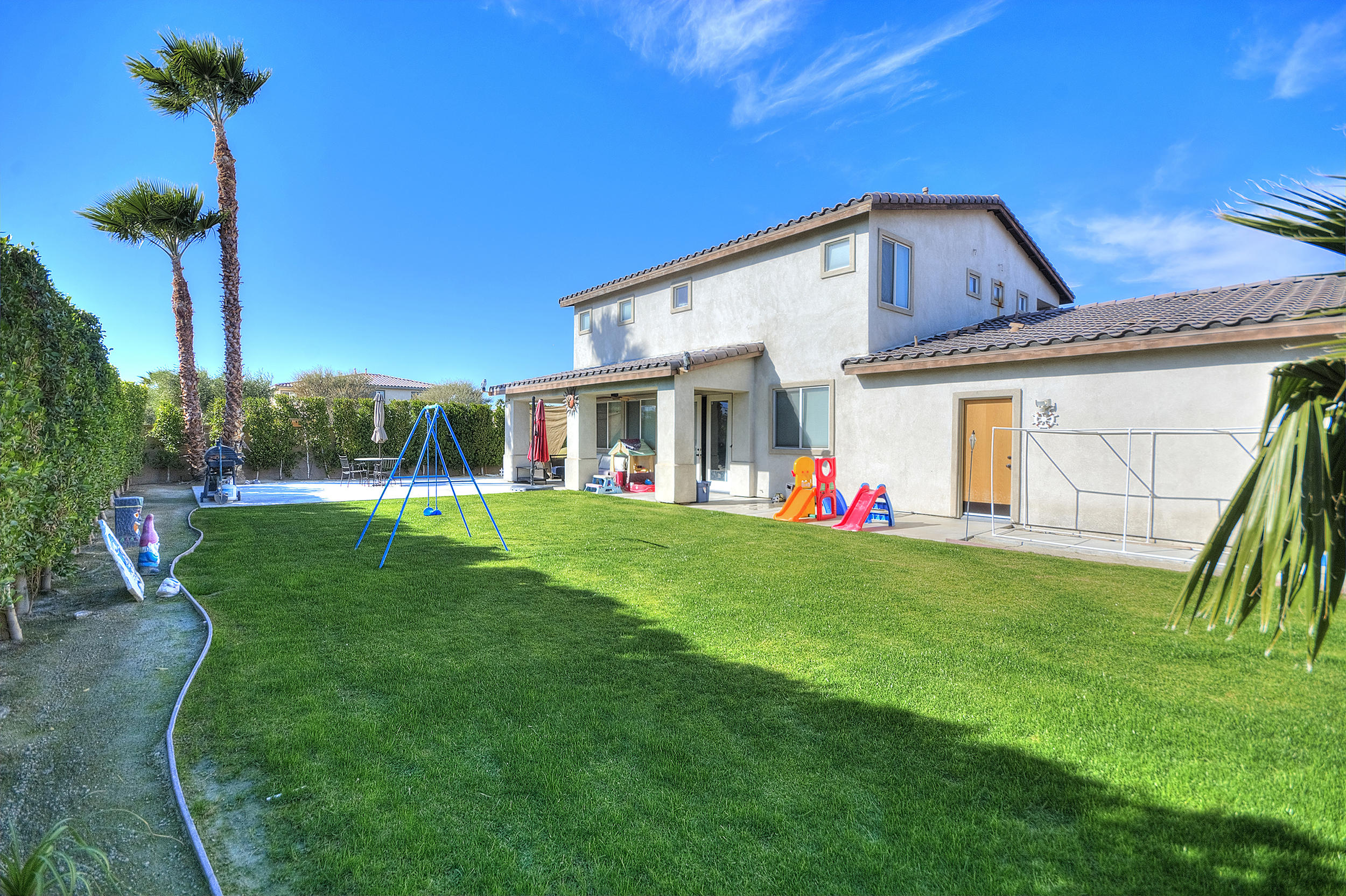 83387 Lightning Road Indio, CA 92203 - Photo 2 of 20 a view of a house with a yard