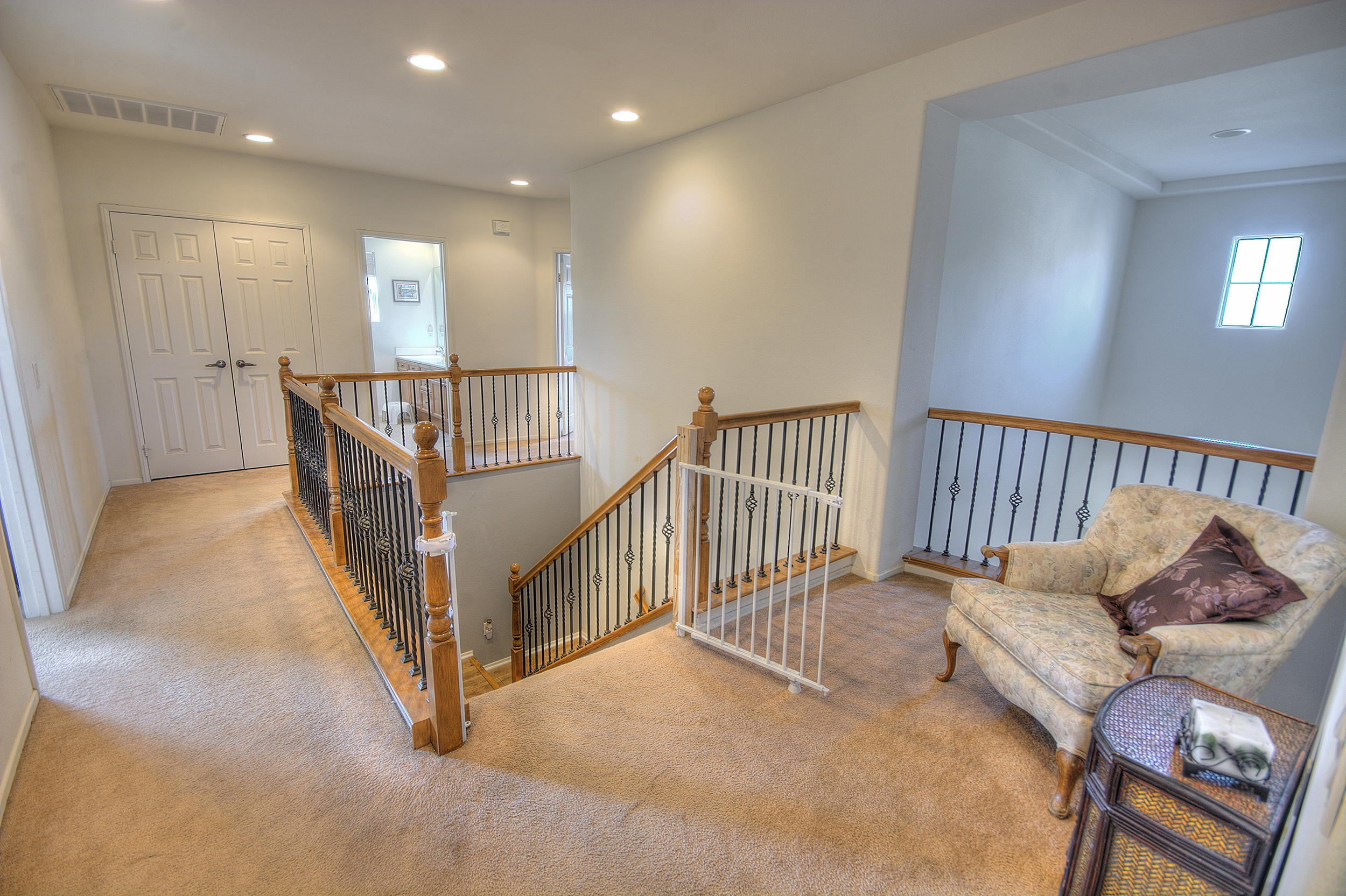 83387 Lightning Road Indio, CA 92203 - Photo 15 of 20 a view of staircase with lots of white furniture