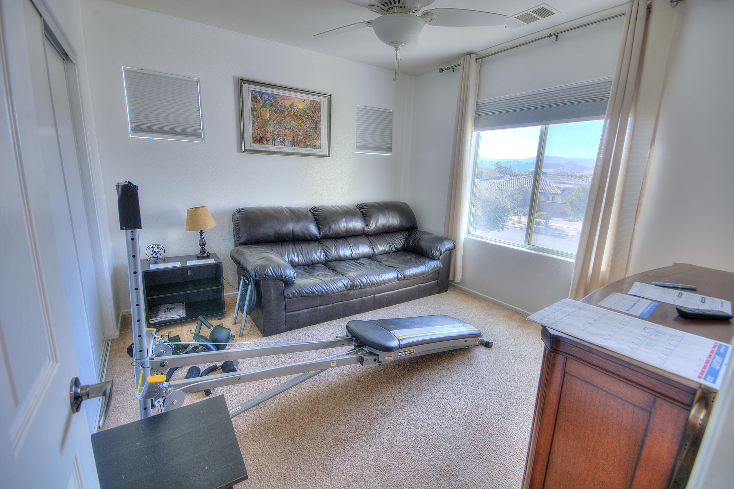 83387 Lightning Road Indio, CA 92203 - Photo 17 of 20 a living room with furniture and a window