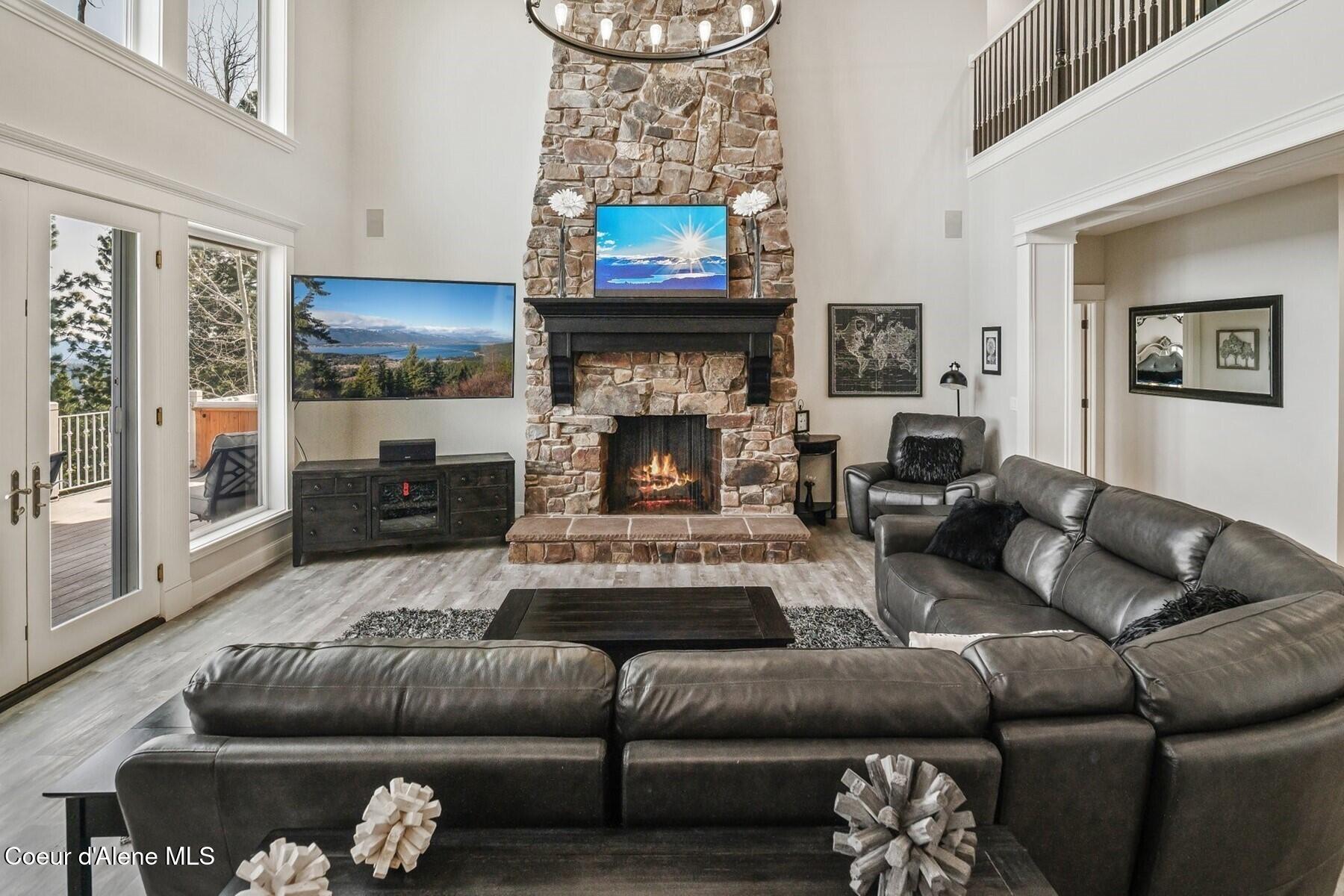 1238 North Reynolds Road Coeur D'Alene, ID 83814 - Photo 4 of 67 2 story stone fireplace