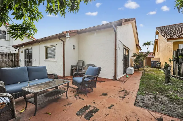 a view of a backyard with a garden