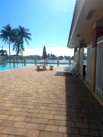 a view of a lake with a yard