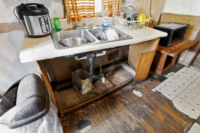 a bed room with a bed and a window