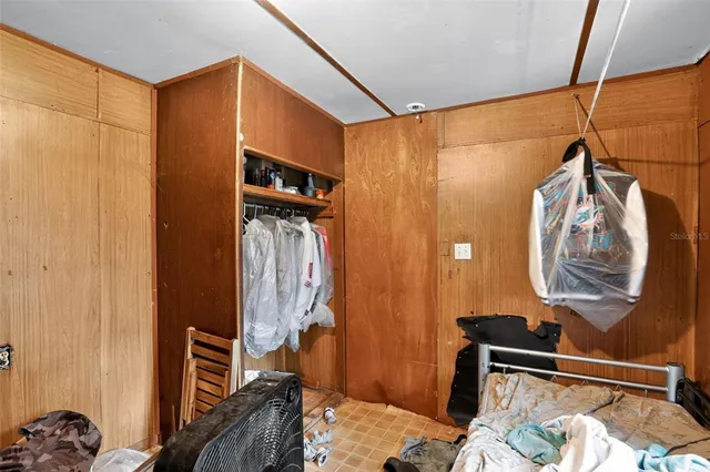 a view of a tree in the middle of a yard